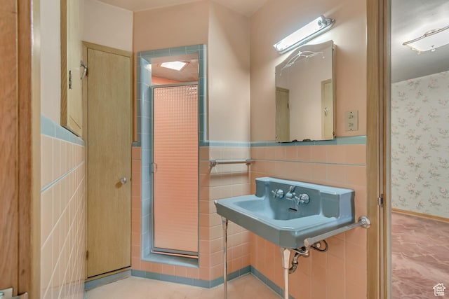 687 N Main St, Spanish Fork, UT 84660 - bathroom with a wainscoted wall, tile walls, and wallpapered walls
