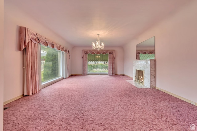 687 N Main St, Spanish Fork, UT 84660 - unfurnished living room with a chandelier, carpet flooring, and a premium fireplace