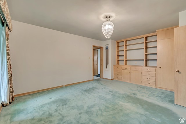 687 N Main St, Spanish Fork, UT 84660 - empty room featuring a chandelier, light colored carpet, and baseboards