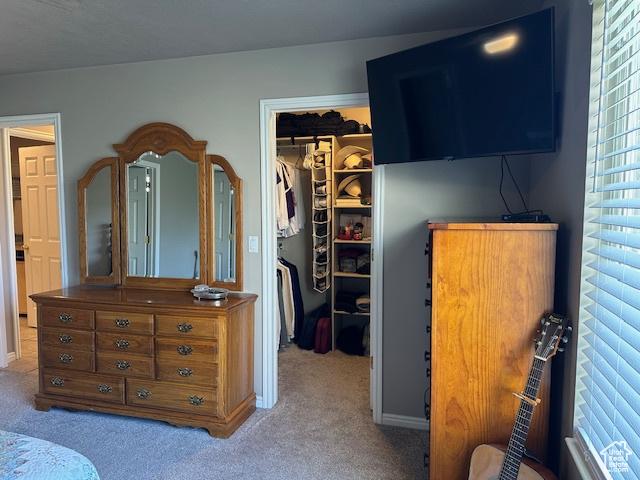 2025 E Skyline Dr, South Ogden, UT 84403 - bedroom with a walk in closet, a closet, and carpet flooring