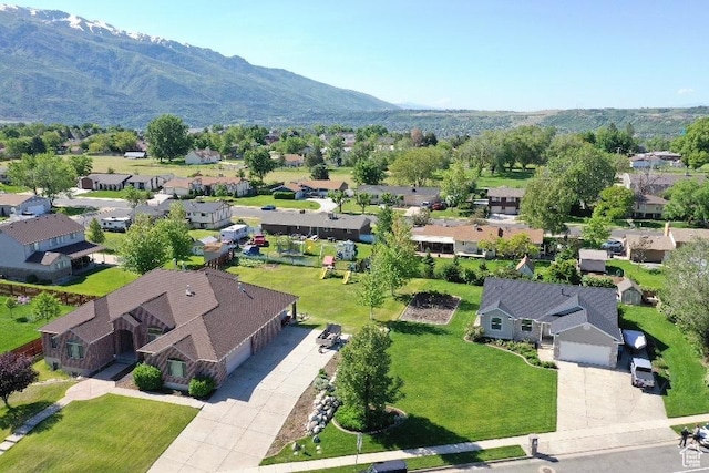 2025 E Skyline Dr, South Ogden, UT 84403 - aerial perspective of suburban area with a mountain backdrop