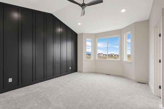 2409 W 3000 N, Farr West, UT 84404 - unfurnished bedroom with light colored carpet, lofted ceiling, recessed lighting, and ceiling fan