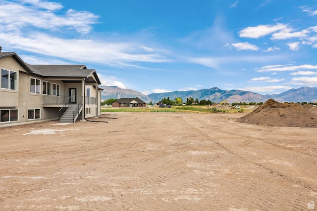 2409 W 3000 N, Farr West, UT 84404 - view of yard featuring a mountain view and stairway