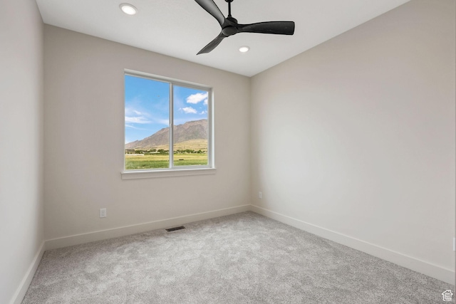 2409 W 3000 N, Farr West, UT 84404 - carpeted empty room with a ceiling fan, a mountain view, and recessed lighting
