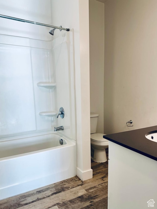 875 S Depot St Unit C211, Clearfield, UT 84015 - full bath featuring vanity, wood finished floors, bathing tub / shower combination, and toilet