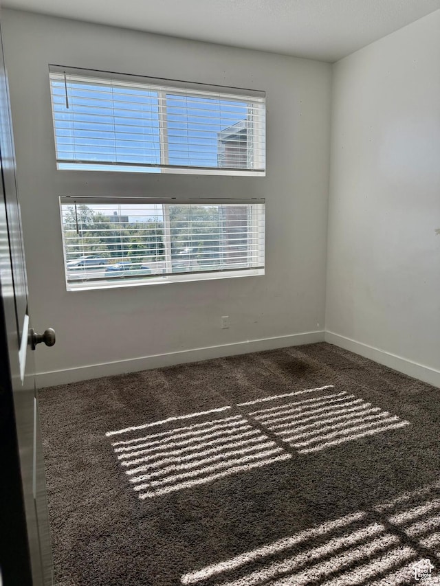 875 S Depot St Unit C211, Clearfield, UT 84015 - empty room with baseboards and carpet