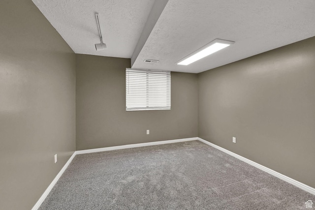 639 W 3750 S, Riverdale, UT 84405 - unfurnished room with a textured ceiling, carpet flooring, and baseboards