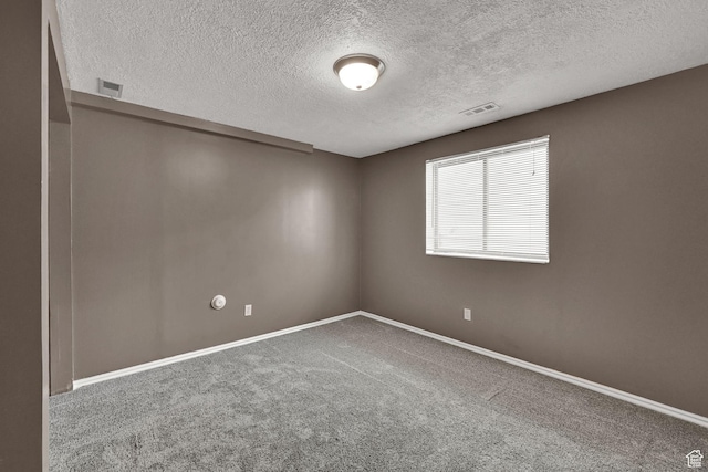 639 W 3750 S, Riverdale, UT 84405 - spare room featuring a textured ceiling, carpet, and baseboards