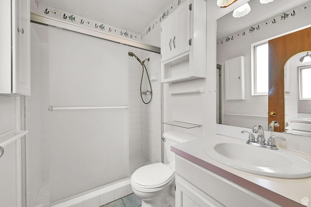 639 W 3750 S, Riverdale, UT 84405 - bathroom with toilet, a stall shower, vanity, and tile patterned floors