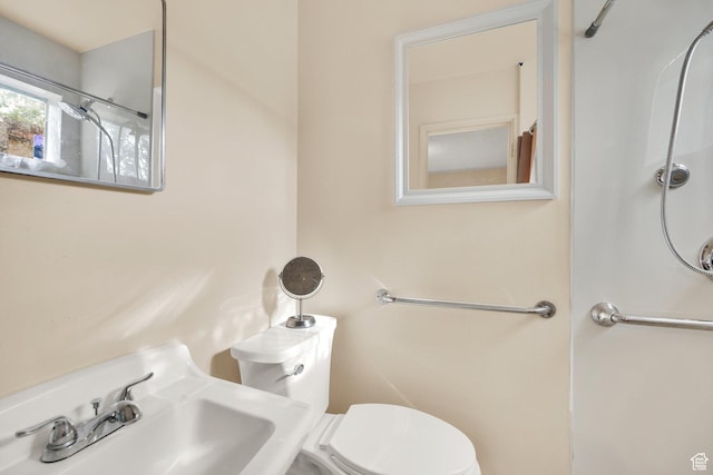 4655 W 4715 S, Salt Lake City, UT 84118 - bathroom featuring toilet and a sink