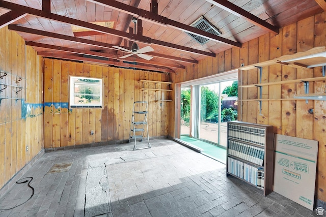 4655 W 4715 S, Salt Lake City, UT 84118 - unfurnished room with healthy amount of natural light, wooden walls, and a ceiling fan