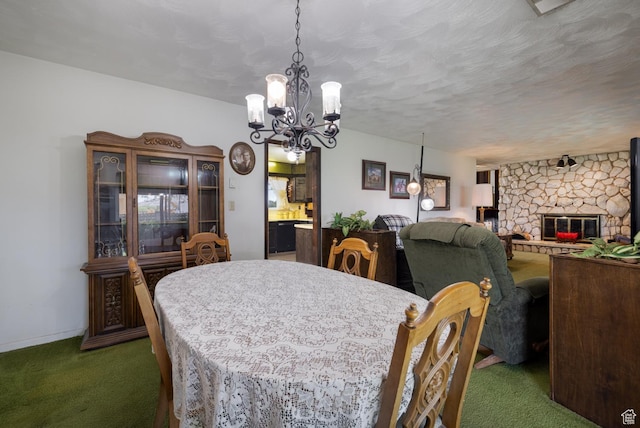 550 S 1500 W, Vernal, UT 84078 - carpeted dining space featuring a chandelier and a fireplace
