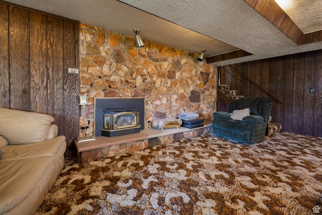 550 S 1500 W, Vernal, UT 84078 - carpeted living area with wood walls and a textured ceiling