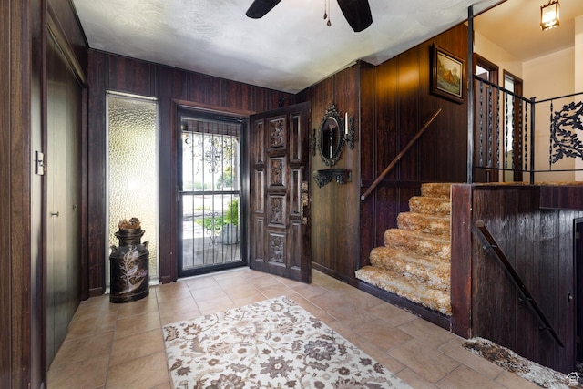 550 S 1500 W, Vernal, UT 84078 - foyer with stairs, wooden walls, and ceiling fan
