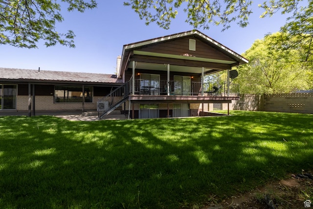 550 S 1500 W, Vernal, UT 84078 - back of house featuring stairway, brick siding, and a patio