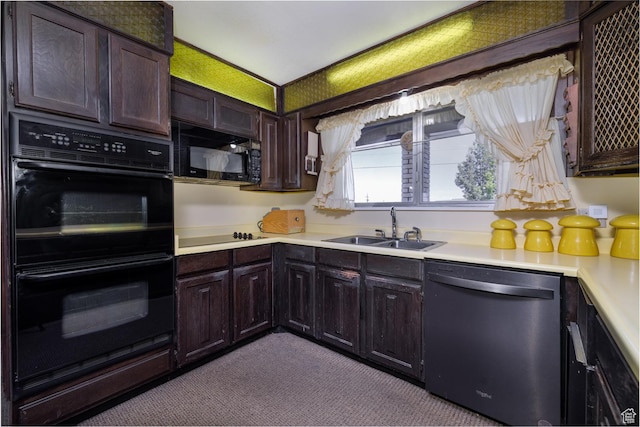 550 S 1500 W, Vernal, UT 84078 - kitchen with black appliances, a sink, light countertops, dark brown cabinetry, and dark carpet