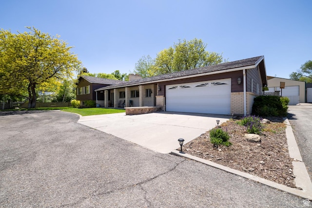 550 S 1500 W, Vernal, UT 84078 - single story home featuring brick siding, an attached garage, and concrete driveway