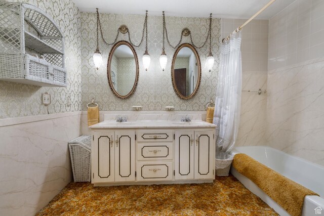 550 S 1500 W, Vernal, UT 84078 - bathroom featuring double vanity, shower / tub combo, wallpapered walls, and tile walls