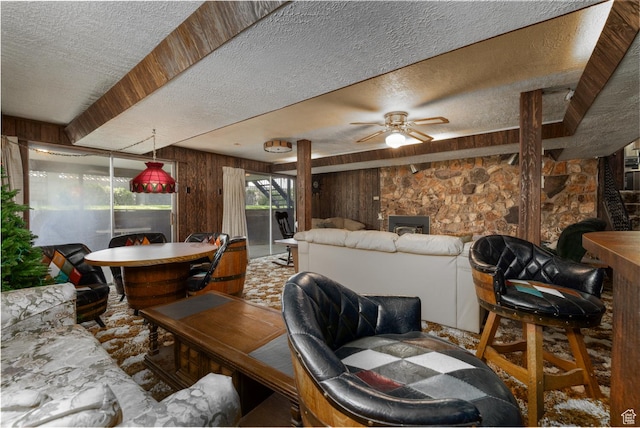550 S 1500 W, Vernal, UT 84078 - living area featuring a textured ceiling, wooden walls, and ceiling fan