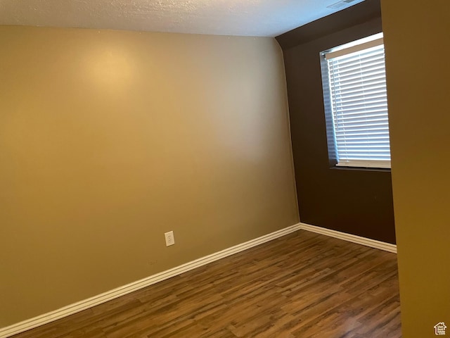 13778 S 2260 W, Riverton, UT 84065 - unfurnished room with dark wood-type flooring and baseboards