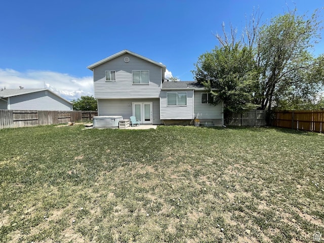 13778 S 2260 W, Riverton, UT 84065 - rear view of house with french doors and a patio