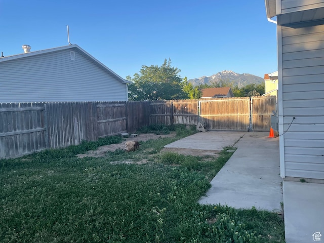 13778 S 2260 W, Riverton, UT 84065 - view of yard featuring a patio area and a mountain view