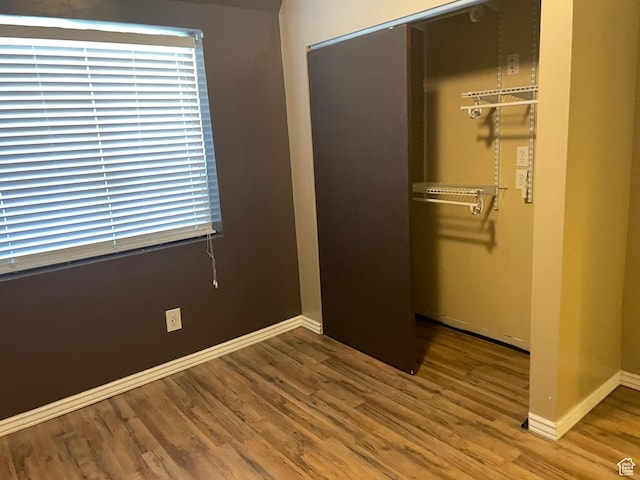 13778 S 2260 W, Riverton, UT 84065 - unfurnished bedroom with a closet, wood finished floors, and baseboards