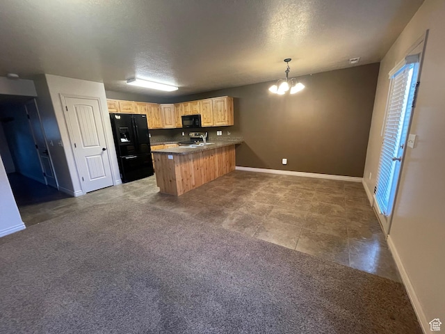 1126 W Lancelot Ln, West Haven, UT 84401 - kitchen with black appliances, a peninsula, baseboards, light brown cabinetry, and a chandelier