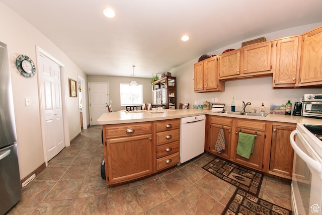 1969 N 275 W, Harrisville, UT 84414 - kitchen featuring white appliances, a sink, a peninsula, light countertops, and recessed lighting