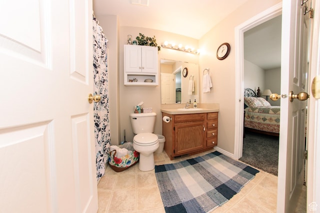 1969 N 275 W, Harrisville, UT 84414 - ensuite bathroom featuring vanity, tile patterned floors, and toilet