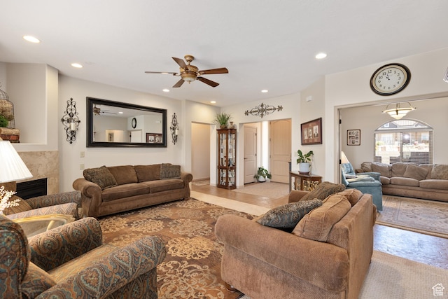 1374 E Big Pinion Ln, Apple Valley, UT 84737 - living area featuring a ceiling fan, a premium fireplace, and recessed lighting