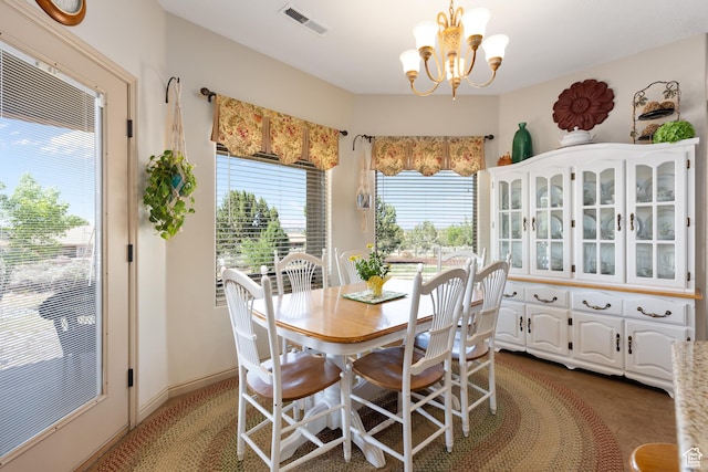 1374 E Big Pinion Ln, Apple Valley, UT 84737 - carpeted dining space featuring a chandelier