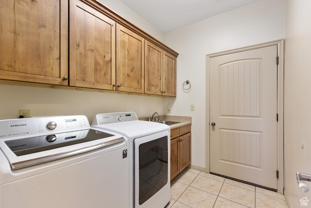 1374 E Big Pinion Ln, Apple Valley, UT 84737 - laundry room with washing machine and clothes dryer, cabinet space, and light tile patterned flooring