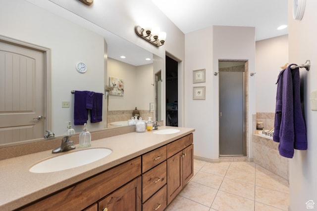 1374 E Big Pinion Ln, Apple Valley, UT 84737 - bathroom with a stall shower, a bath, tile patterned floors, double vanity, and a spacious closet