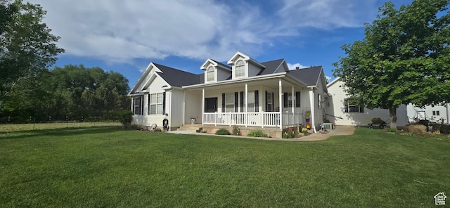 6897 S 4000 W, Benjamin, UT 84660 - view of front of house featuring covered porch and a front lawn