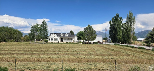 6897 S 4000 W, Benjamin, UT 84660 - view of front of home featuring a rural view and a mountain view