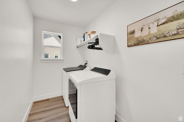 12297 S Boggs Way, Herriman, UT 84096 - washroom with washing machine and dryer, light wood-style floors, and baseboards