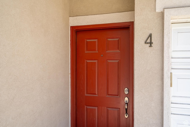 1052 S Canyon Meadows Dr Unit 4, Provo, UT 84606 - doorway to property with stucco siding