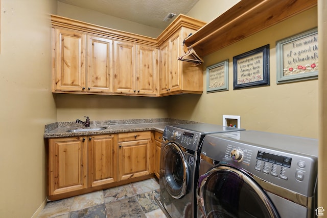 5964 S Ragsdale Dr E, Murray, UT 84121 - laundry room with independent washer and dryer, cabinet space, stone finish floors, and baseboards