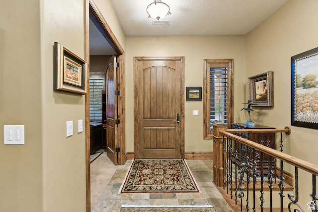 5964 S Ragsdale Dr E, Murray, UT 84121 - foyer with baseboards