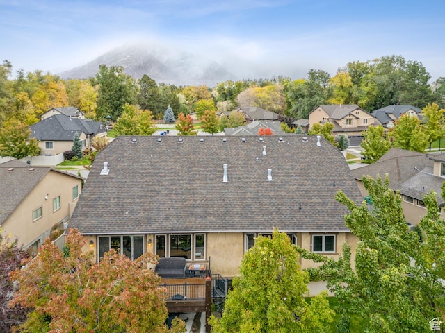 5964 S Ragsdale Dr E, Murray, UT 84121 - aerial view of residential area with a mountainous background