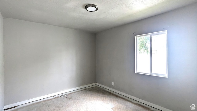4650 W Mildred St, Kearns, UT 84118 - empty room with baseboards and tile patterned floors