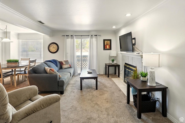 875 E Arrowhead Ln S Unit 3, Murray, UT 84107 - living area with light carpet, ornamental molding, a tile fireplace, and baseboards