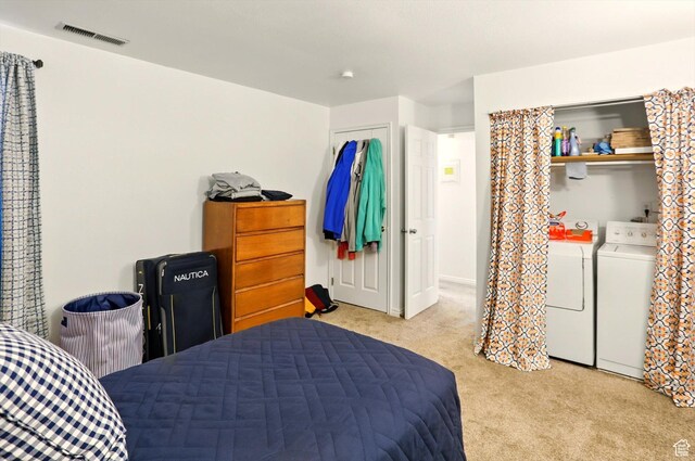 875 E Arrowhead Ln S Unit 3, Murray, UT 84107 - bedroom with light carpet and washer and clothes dryer