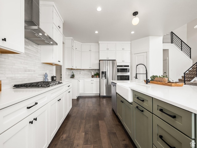 4823 N Canaan Peak Dr W, Eagle Mountain, UT 84005 - kitchen with wall chimney exhaust hood, a sink, appliances with stainless steel finishes, gray cabinets, and light countertops