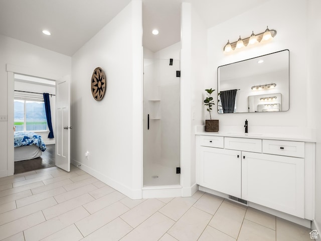 4823 N Canaan Peak Dr W, Eagle Mountain, UT 84005 - ensuite bathroom with vanity, a shower stall, baseboards, vaulted ceiling, and recessed lighting