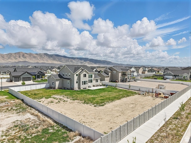 4823 N Canaan Peak Dr W, Eagle Mountain, UT 84005 - back of property with a residential view, a fenced backyard, and a mountain view
