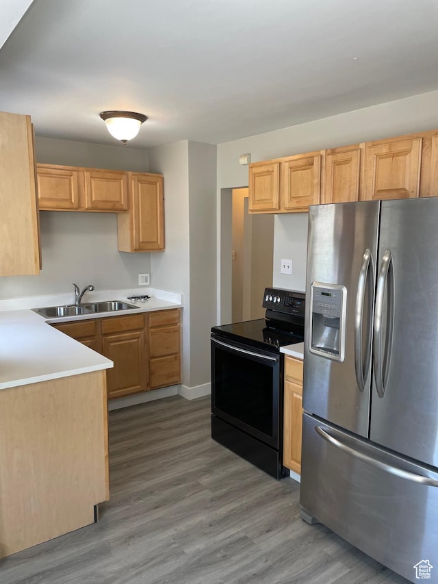 197 Ross Dr Lot 6, Clearfield, UT 84015 - kitchen featuring stainless steel fridge with ice dispenser, black / electric stove, a sink, and wood finished floors