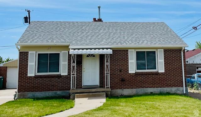 197 Ross Dr Lot 6, Clearfield, UT 84015 - bungalow-style house featuring brick siding, a front lawn, and roof with shingles