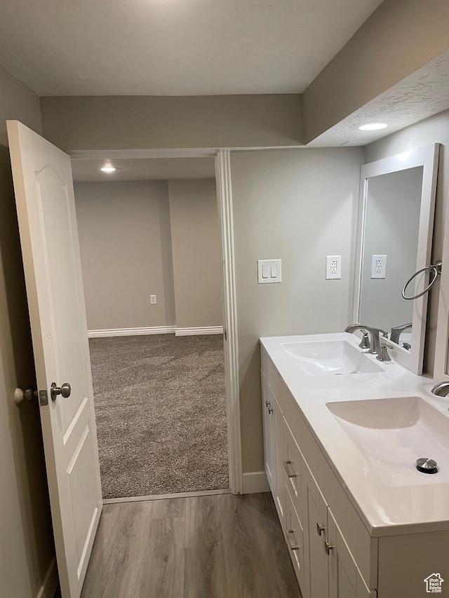 197 Ross Dr Lot 6, Clearfield, UT 84015 - bathroom with double vanity, baseboards, and wood finished floors